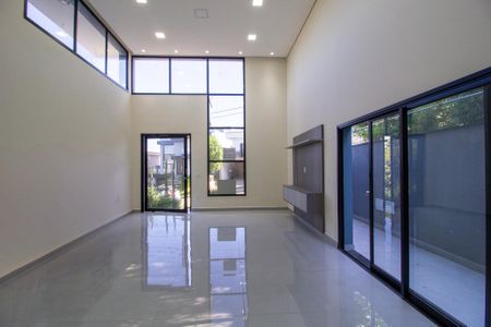 Casa de condomínio para alugar com 300m², 4 quartos e 4 vagasSala