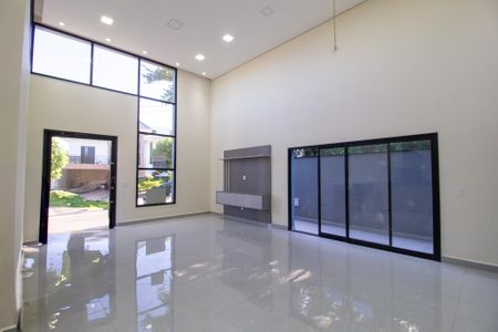 Casa de condomínio para alugar com 300m², 4 quartos e 4 vagasSala