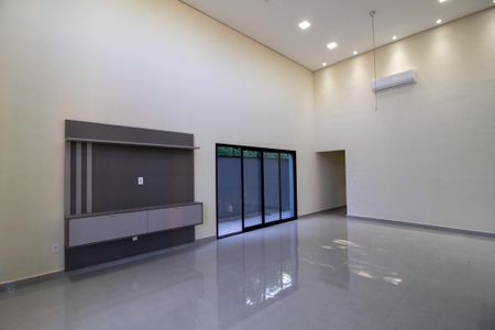 Casa de condomínio para alugar com 300m², 4 quartos e 4 vagasSala