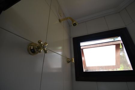 Casa de condomínio para alugar com 420m², 4 quartos e 7 vagasSuíte Banheiro 3