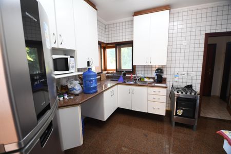 Casa de condomínio para alugar com 420m², 4 quartos e 7 vagasCozinha