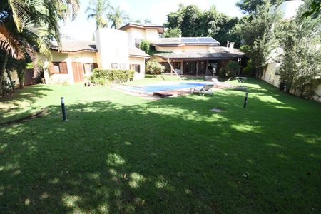 Casa de condomínio para alugar com 420m², 4 quartos e 7 vagasQuintal / Jardim