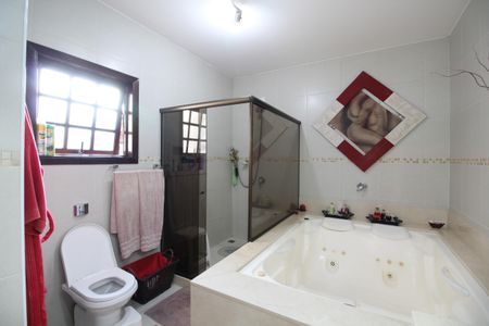 Casa de condomínio à venda com 313m², 5 quartos e 7 vagasQuarto 4 - Banheiro da Suíte