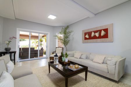 Casa de condomínio à venda com 390m², 4 quartos e 4 vagasSala