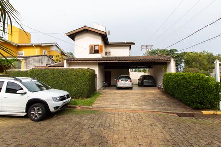 Casa de condomínio à venda com 230m², 3 quartos e 4 vagasFachada