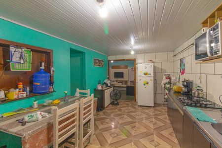 Casa à venda com 70m², 2 quartos e 2 vagas Casa à venda com 70m², 2 quartos e 2 vagasCozinha