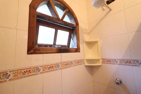 Casa de condomínio à venda com 380m², 6 quartos e 6 vagasBanheiro de serviço