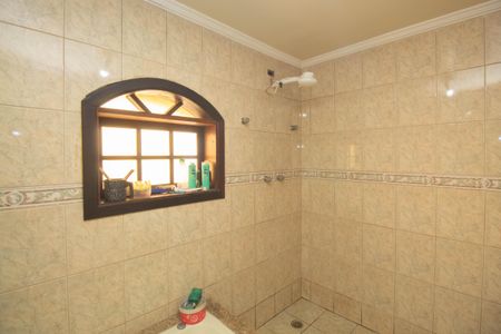 Casa para alugar com 510m², 5 quartos e 6 vagasBanheiro da Suíte 1