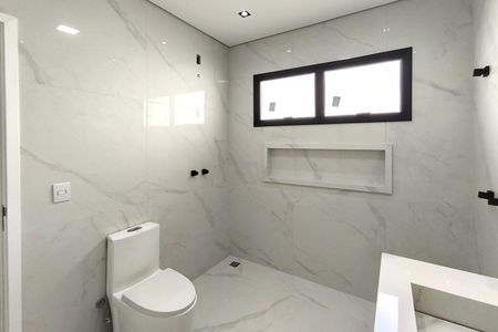 Casa de condomínio à venda com 300m², 4 quartos e 4 vagas Casa de condomínio à venda com 300m², 4 quartos e 4 vagasBanheiro da Suíte 1