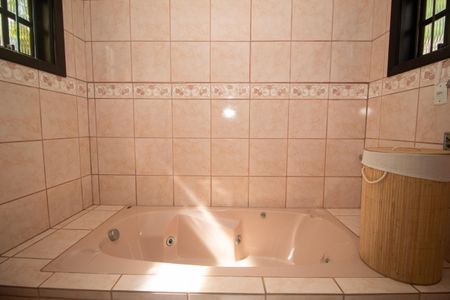 Casa à venda com 451m², 4 quartos e 4 vagasBanheiro Suíte