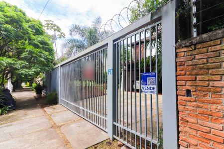 Casa à venda com 324m², 8 quartos e 4 vagasFachada e Placa