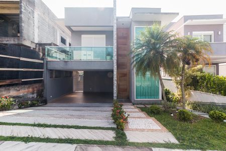 Casa de condomínio para alugar com 250m², 3 quartos e 4 vagasFachada