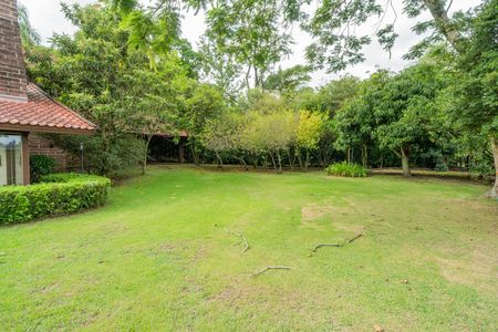 Casa de condomínio para alugar com 590m², 5 quartos e 5 vagasQuintal