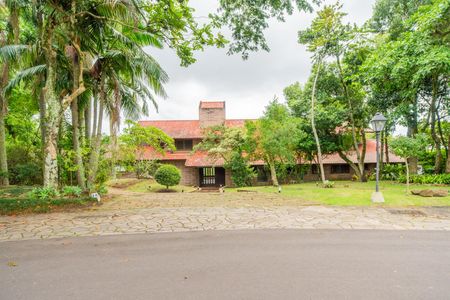 Casa de condomínio para alugar com 590m², 5 quartos e 5 vagasFachada