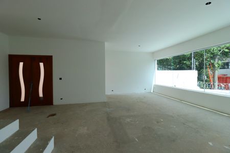 Casa à venda com 258m², 4 quartos e 4 vagasSala