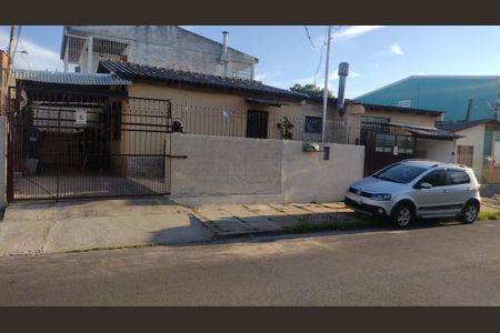 Casa à venda com 60m², 3 quartos e 2 vagas Casa à venda com 60m², 3 quartos e 2 vagasFachada