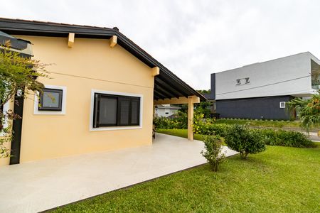 Casa de condomínio para alugar com 455m², 4 quartos e 2 vagasFachada
