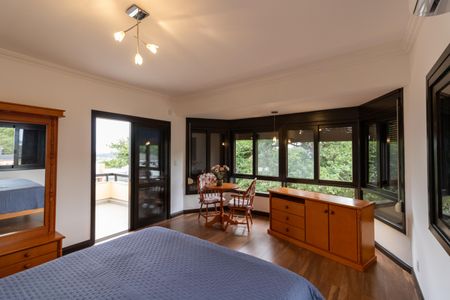 Casa de condomínio para alugar com 455m², 4 quartos e 2 vagasSuíte