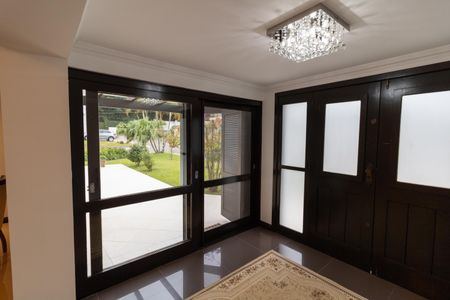 Casa de condomínio para alugar com 455m², 4 quartos e 2 vagasHall de entrada