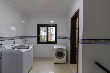 Casa de condomínio para alugar com 455m², 4 quartos e 2 vagasLavanderia