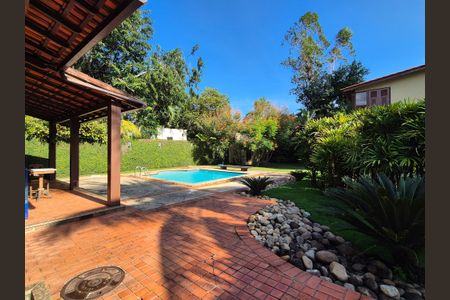 Casa de condomínio à venda com 400m², 4 quartos e 5 vagas Casa de condomínio à venda com 400m², 4 quartos e 5 vagasÁrea externa