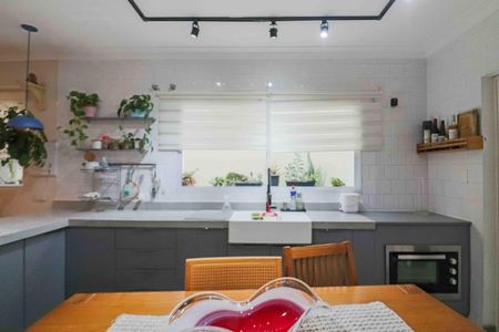 Casa de condomínio à venda com 125m², 3 quartos e 4 vagas Casa de condomínio à venda com 125m², 3 quartos e 4 vagasCozinha