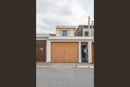 Casa à venda com 125m², 2 quartos e 2 vagas Casa à venda com 125m², 2 quartos e 2 vagasFachada + placa