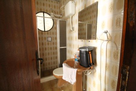 Casa de condomínio à venda com 249m², 3 quartos e 3 vagasBanheiro 2