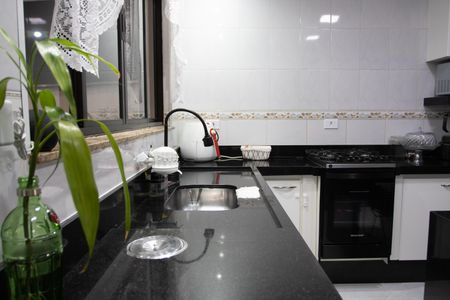 Casa à venda com 120m², 2 quartos e 2 vagas Casa à venda com 120m², 2 quartos e 2 vagasCozinha