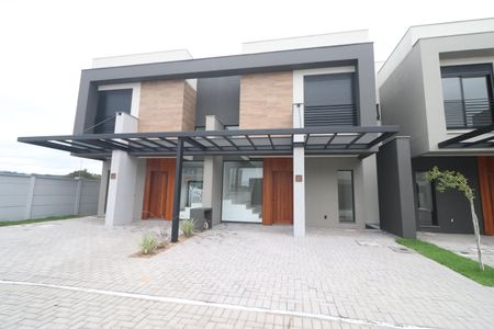 Casa de condomínio à venda com 131m², 3 quartos e 2 vagasFachada