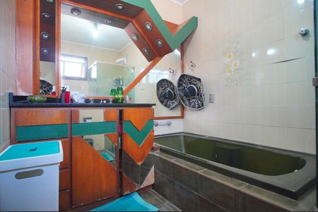 Casa à venda com 307m², 4 quartos e 2 vagasBanheiro da Suíte