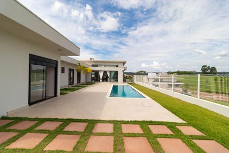 Casa de condomínio à venda com 496m², 4 quartos e 3 vagasQuintal