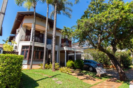 Casa de condomínio para alugar com 450m², 4 quartos e 4 vagasFachada