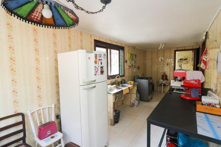 Casa à venda com 140m², 4 quartos e 4 vagas Casa à venda com 140m², 4 quartos e 4 vagasCozinha