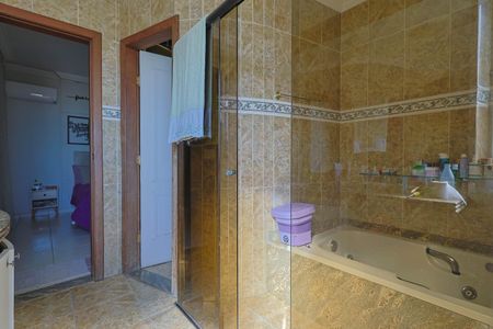 Casa à venda com 406m², 4 quartos e 3 vagasBanheiro da Suíte