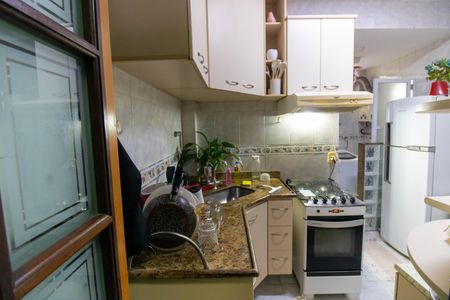 Apartamento à venda com 76m², 4 quartos e 1 vaga Apartamento à venda com 76m², 4 quartos e 1 vagaCozinha e Área de Serviço