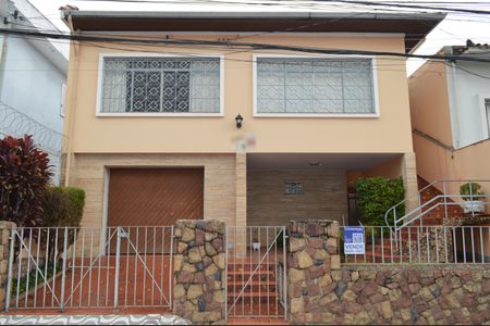 Casa à venda com 337m², 3 quartos e 2 vagasFachada + Plaquinha