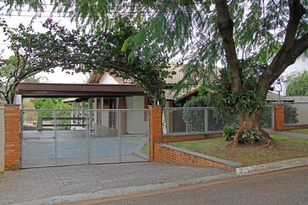 Casa de condomínio para alugar com 399m², 4 quartos e 4 vagasFachada 