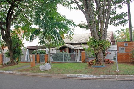 Casa de condomínio para alugar com 399m², 4 quartos e 4 vagasFachada 