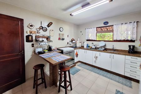 Casa de condomínio à venda com 380m², 4 quartos e 4 vagas Casa de condomínio à venda com 380m², 4 quartos e 4 vagasCozinha