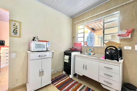 Casa à venda com 200m², 3 quartos e 4 vagas Casa à venda com 200m², 3 quartos e 4 vagasCozinha