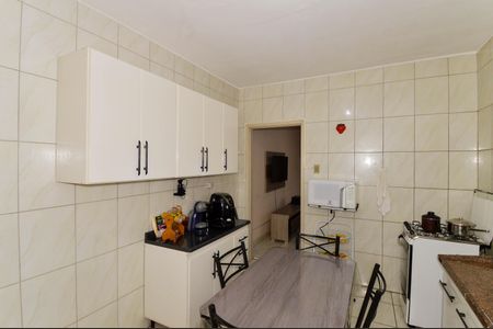 Casa à venda com 105m², 4 quartos e 2 vagas Casa à venda com 105m², 4 quartos e 2 vagasCozinha