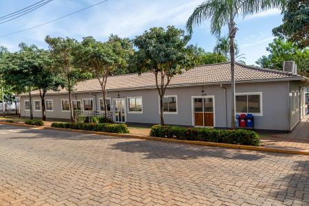 Apartamento para alugar com 51m², 2 quartos e 1 vagaÁrea comum- Fachada do prédio do salão de festa, administração e sala de Jujit-su