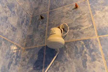 Casa à venda com 210m², 4 quartos e 2 vagas Casa à venda com 210m², 4 quartos e 2 vagasBanheiro da Suíte 1