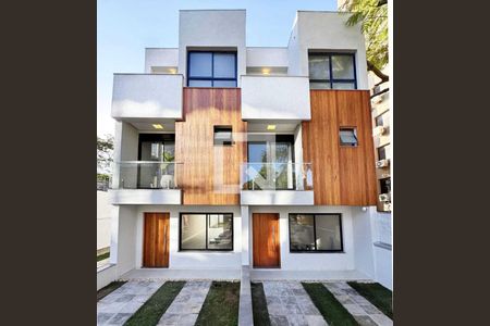 Casa de condomínio à venda com 167m², 4 quartos e 2 vagasFachada Casa