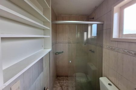 Casa de condomínio para alugar com 337m², 3 quartos e 3 vagasBanheiro da Suíte 3