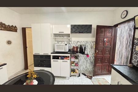 Casa à venda com 129m², 3 quartos e 3 vagas Casa à venda com 129m², 3 quartos e 3 vagasCozinha