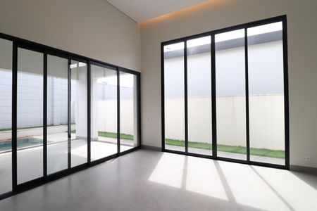 Casa de condomínio para alugar com 218m², 4 quartos e 2 vagasSala
