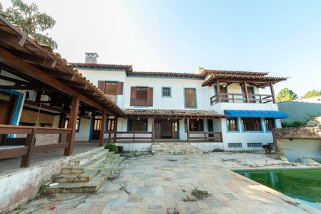 Casa de condomínio para alugar com 750m², 6 quartos e 4 vagas