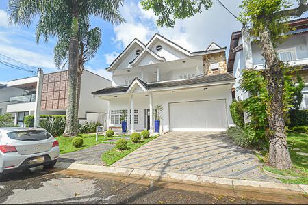 Casa de condomínio à venda com 570m², 5 quartos e 4 vagasFachada